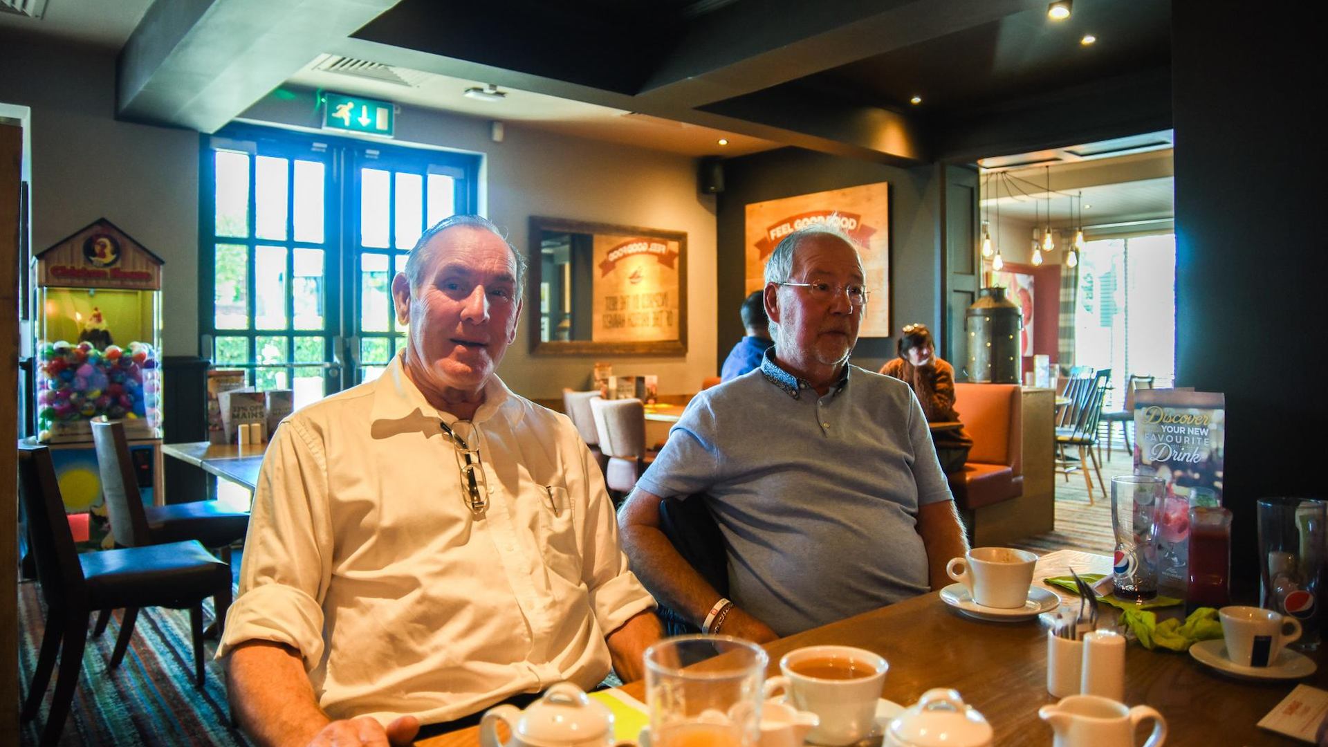 Two older men in a pub