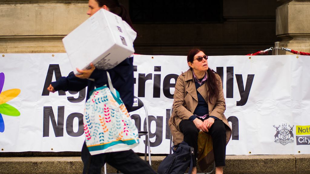 Older woman sitting on a chair