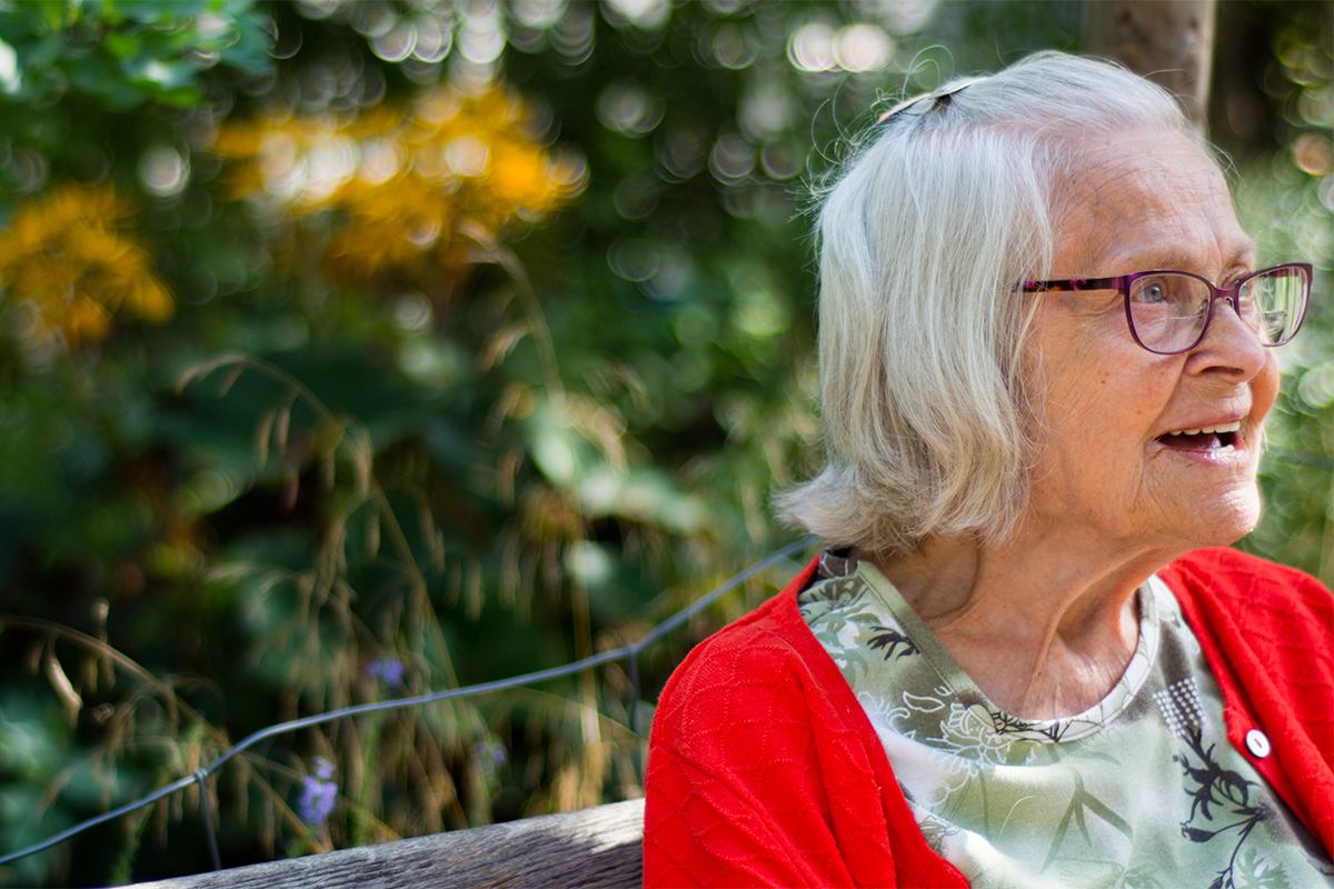 Woman seated on a park bench