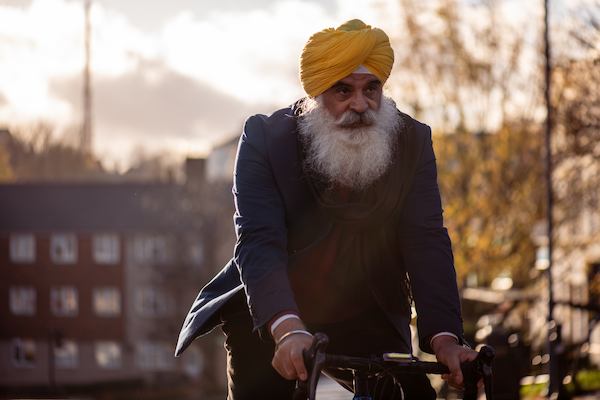Sikh man cycling